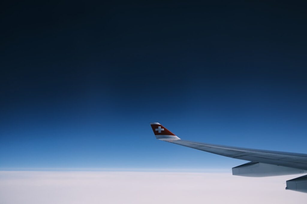 an airplane wing in the sky