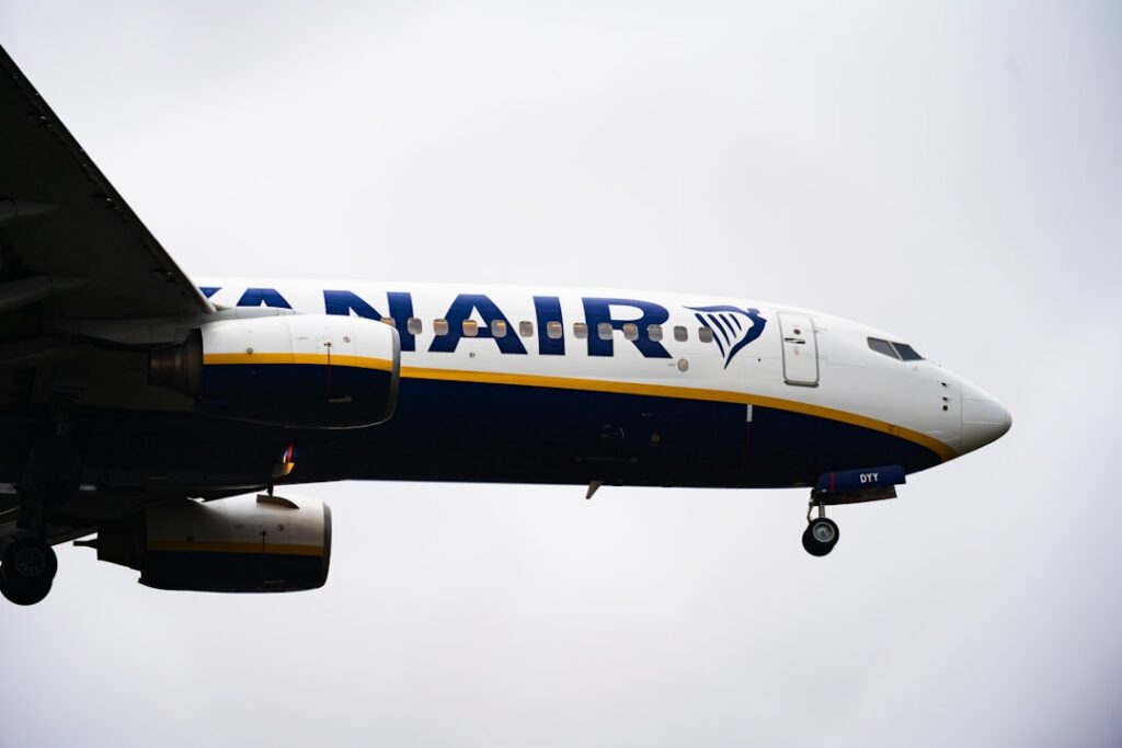 Ryanair airplane flying in cloudy sky