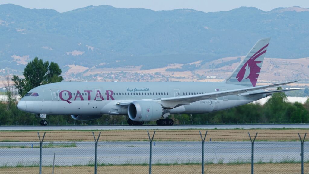 Qatar airways airplane on the tarmac